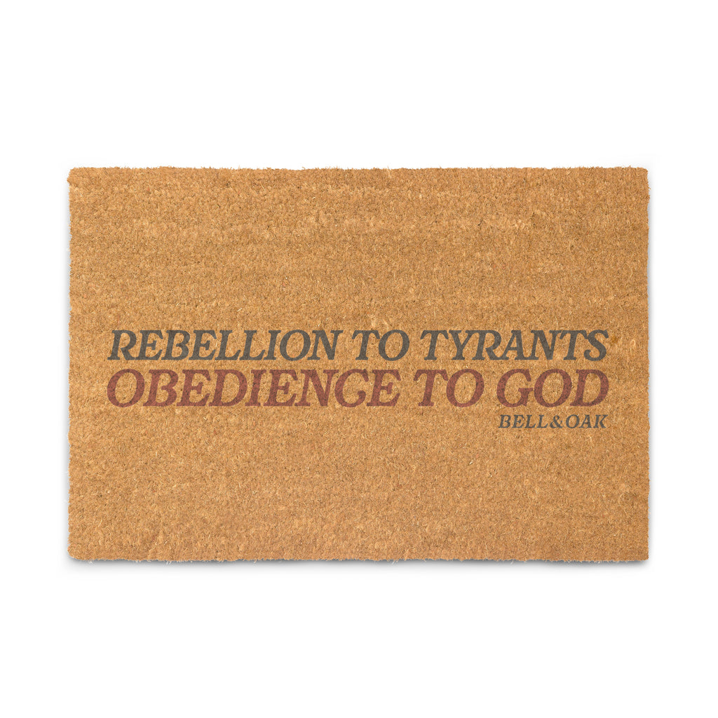 Patriotic doormat featuring the phrase "Rebellion to Tyrants Is Obedience to God" inspired by America's founding principles and heritage